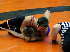 Tony Duman goes for a pin in the fifth place match.