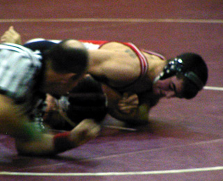 Nick Uhlenkott goes for the pin.
