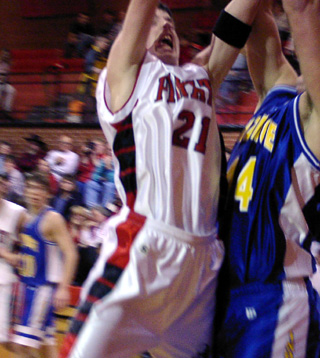 Corey Schaeffer goes for a lay-up against Nezperce.