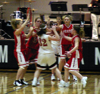 Prairie defenders swarm to the ball. From left are Meghan VanderPas, Briget Long, Bridget Enneking and Ashley Jackson.