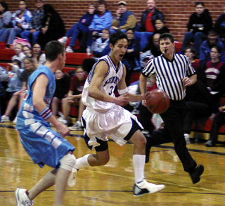 Dylan Greene drives downcourt against the Lapwai JVs.