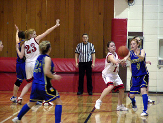 Prairie's defense shut down Genesee in the second quarter. Here Natalie Arnzen denies the entry pass to the post while Ashley Jackson defends the ball.