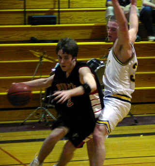 Sean Daly drives the baseline at Timberline.