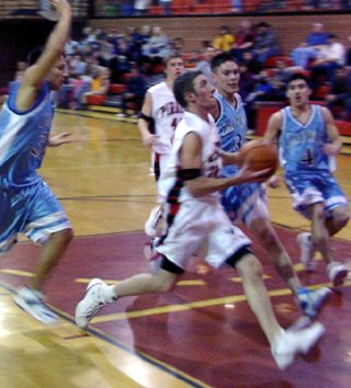 Kevin Funke goes in for a layup after making a steal.
