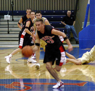 Mat Forsmann heads for the hoop after a steal.