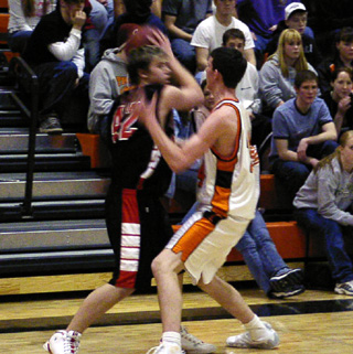 Ryan Daly looks to make a pass in the Troy game.