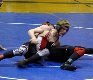 Shane Poxleitner in the championship match at 135 lbs.