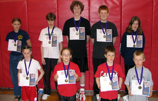 From left starting from the top row are: Leora Laurino, Eric Daly, Tyler Forsmann, David Johnson, and Rachel Wemhoff. Kneeling left to right at the bottom row are: MaKayla Schaeffer, Demetria Riener, Beau Schlader, and Marcus Higgins. Not present: Jennifer Enneking.