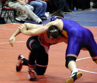 Nick shoots for a takedown against Jack Arnold of New Plymouth.