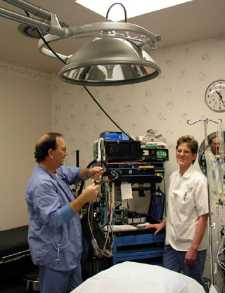 Dennis Tracy, CRNA, is providing pain management services at SMCH with the assistance of Pat Forsmann, Central Services Supervisor.