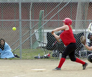 Meghan VanderPas is about to connect for a hit against Kellogg.