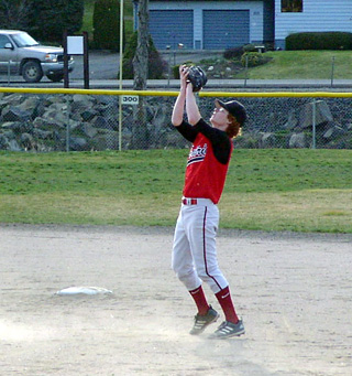 Phil Henry catches an infield popup at Kendrick.