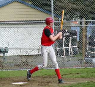 Chad Arnzen swings at a pitch. He later homered in the game.