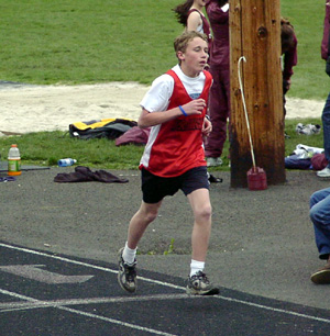 Carson Heath starts another lap of the 1600.