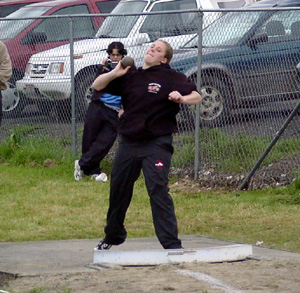 Charlene Duman competes in the shot put.