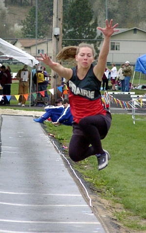 Vanessa Sonnen reaches for the pit in the triple jump.