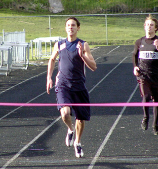 Dylan Greene of Summit Academy wins the 400 meter dash.