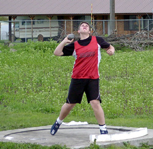 J.D. Riener in the shot put competition.
