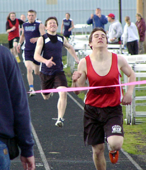 Kelby Wilson wins the 800 with Summit's Shane Wemhoff behind him in second.