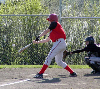 Chris Schumacher is about to connect for a 2-run single.