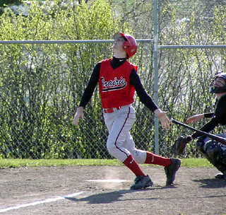 Phil Henry looks up at a pop-up.