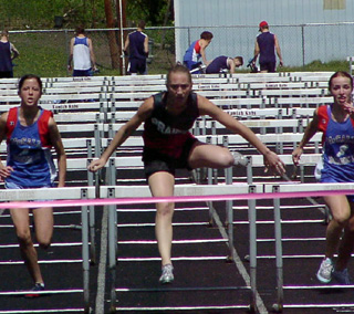 Tabitha Sonnen wins the 100 hurdles.