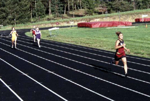 Nicole Nida cruises to a win in the 400 meter dash.