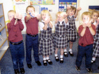 Summit Kindergartners show their science fair projects.