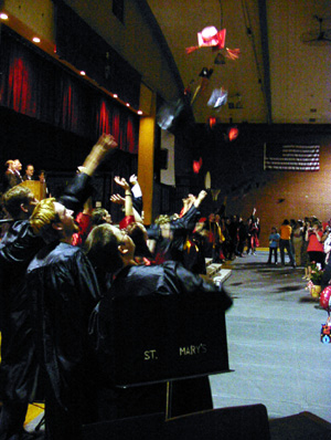 The mortarboards fly after the ceremonies were completed.