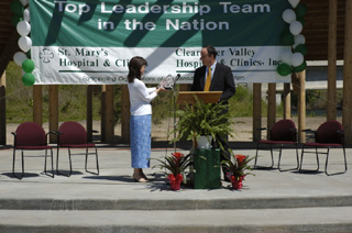 Casey Meza receives the award during a ceremony at Kamiah.