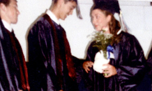 The senior boys presented flowers to their only female classmate, Elaine Rehder.