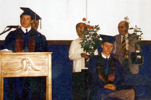 Shane Wemhoff makes a presentation to Percy and Edna Roeper for their help in getting the school started.