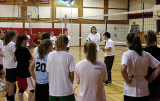 Mari Burningham and Tasha Poduska tell the Prairie volleyball team what they can expect ffor the next 2 days.