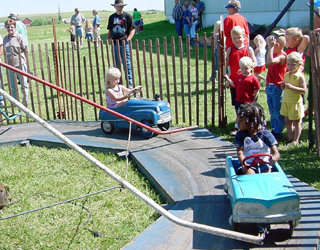 The old kiddie ride is still popular with the youngsters.