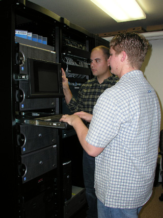 Bryan Skinner, and Drew Johnson work on the server that connects the two hospitals and their 7 satellite medical clinics and 4 PT clinics.