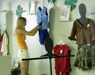 Vanessa Hylton adjusts one of the project displays.