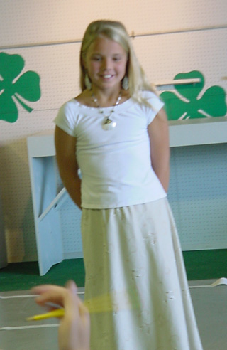 Emily Lane of Harpster stands before the judges.