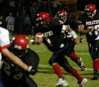 Mat Forsmann tries to pick up yardage on a running play.