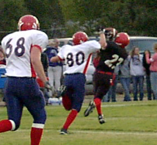 Jacob Holthaus makes an over the shoulder catch early in the game for a big gain.