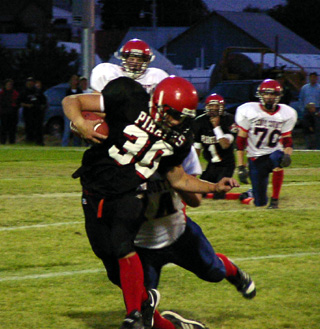 Ryan Daly tries to evade a tackler.