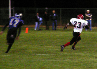 Jacob Holthaus gained big yardage on this catch late in the half. Earlier he scored Prairie's only touchdown.