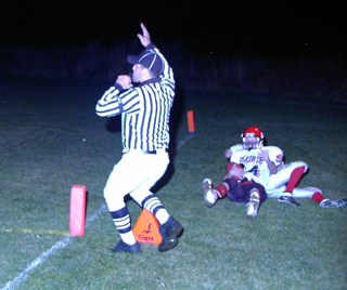 Phil Henry may be out of the end zone after his catch but the ref is about to signal touchdown as Henry caught the ball just inside the pylon.