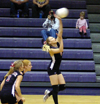 Bridget Enneking reaches for a spike.
