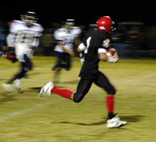 Mat Forsmann is on his way to the end zone on a 27 yard quarterback run up the middle.