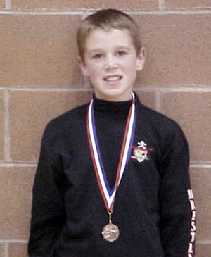 Kade Perrin with his medal.