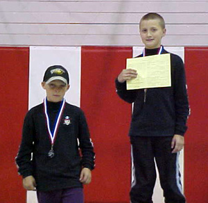 Tayler Heitman and Damien McWilliams, along with Kade Perrin, picture at right, swept all the medals in their weight class.