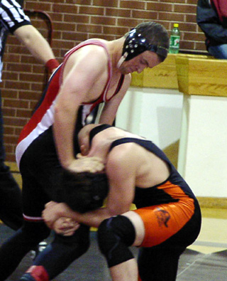 Alex Kuther fights off an opponent's takedown attempt.
