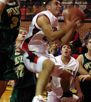 Mat Forsmann gets inside the defense to put up a lay-up.