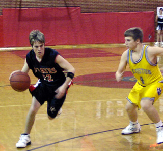 Sean Daly drives past a Lewiston defender.