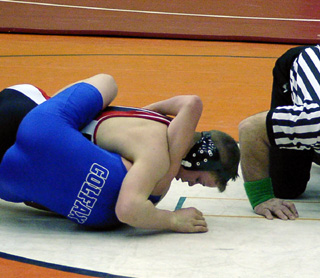 James Jackson is about to pin this opponent on his way to a first place finish.